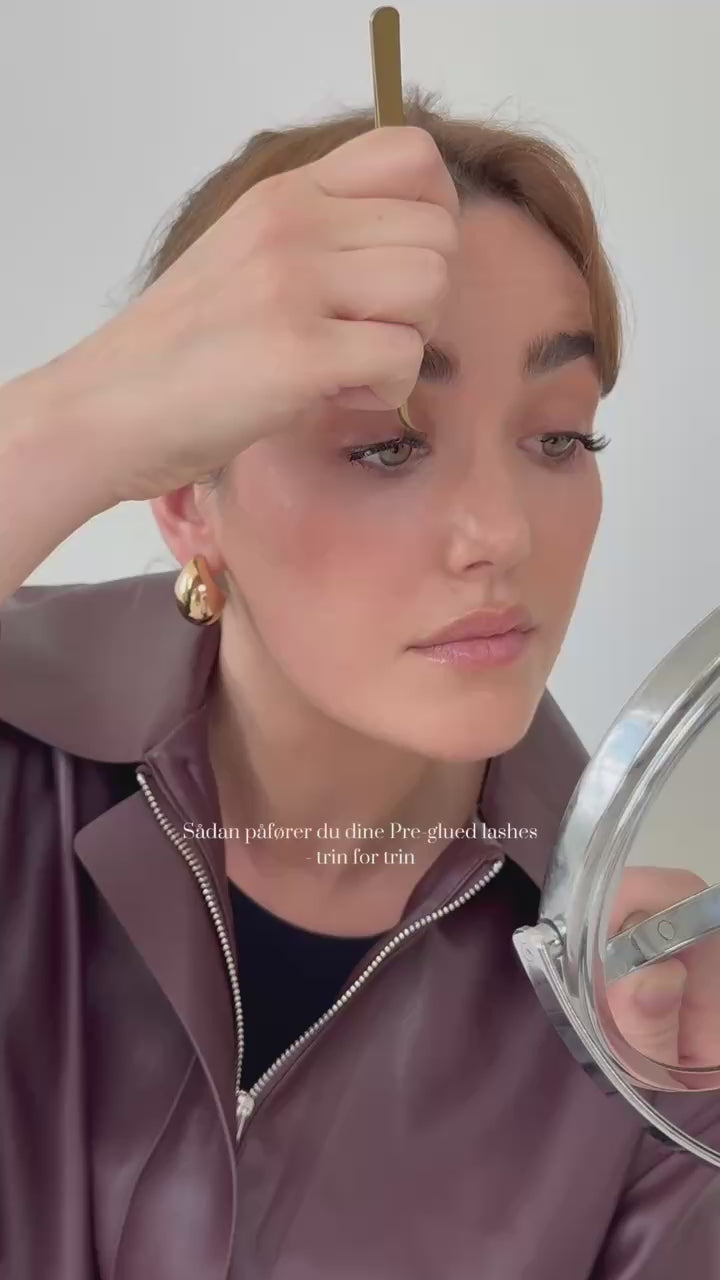 Load video: model der viser hvordan man påfører pre-glued lashes trin for trin